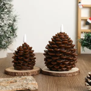 Detailed view of Christmas pinecone shaped LED wax candles with wooden bases for holiday decor.