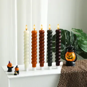 Vue détaillée du lot de bougies LED citrouille d'Halloween, parfait pour déco et ambiance.