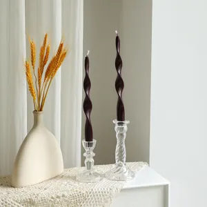 Detailed view of a 25cm twisted scented soy wax candle in glass holder for home decor.