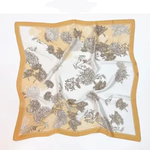Vintage floral silk scarf detail, elegant retro print with yellow border, soft fabric accessory.