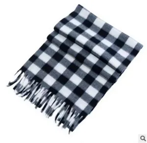 Classic black and white plaid scarf for women, warm winter accessory with soft fringe edge.