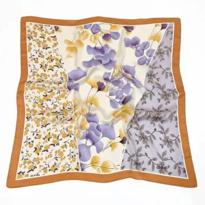 Elegant square silk scarf with vintage floral geometric print and stylish brown border.