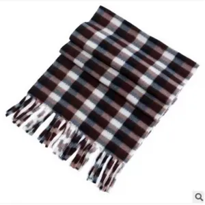 Classic plaid winter scarf with fringe detail, cozy double-sided warm fabric for cold weather.
