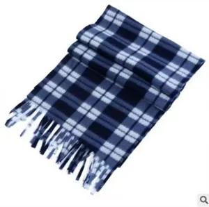 Detailed view of a blue and white plaid fleece scarf, soft texture and classic fringe design.