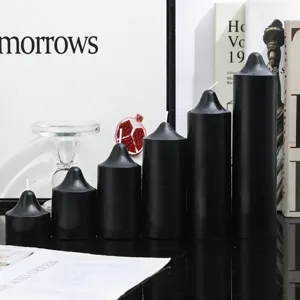 Ensemble de bougies parfumées cylindriques noires pointues pour la décoration et accessoires photo.