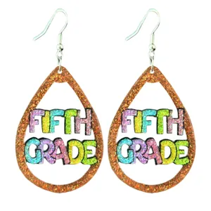 Detailed view of the fifth grade teacher glitter teardrop earrings, colorful back to school design.