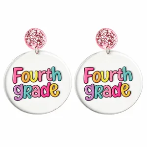 Detailed view of colorful acrylic Fourth Grade dangle earrings with pink glitter studs.