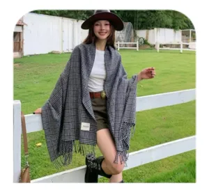 Classic black and white plaid shawl for women, cozy winter tassel scarf and wrap.