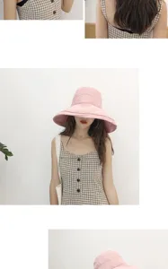 Detailed view of the solid pink peach skin velvet wide brim bucket hat, soft fabric.