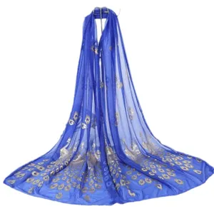 Royal blue sheer scarf with gold foil peacock feather pattern, elegant lightweight accessory.