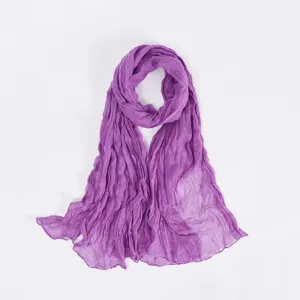 Purple crumpled voile scarf detail view, showing soft crinkled texture and lightweight fabric.
