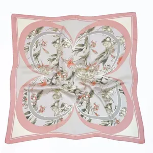 Detailed view of the vintage square scarf with elegant floral print and pink clover design.