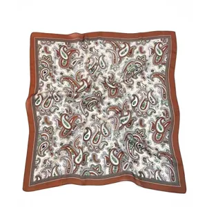 Vintage paisley silk square scarf detail shot, elegant brown border fashion accessory.