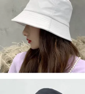 Minimalist white cotton bucket hat for daily sun protection and casual outdoor wear.