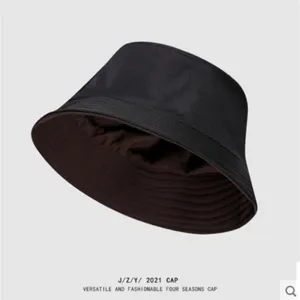 Classic black reversible bucket hat, versatile minimalist Japanese style sun hat.