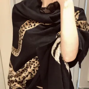Elegant black leopard print scarf for women, vintage style winter warm shawl wrap.