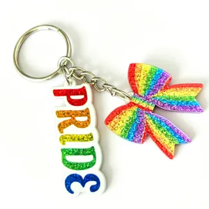 Colorful rainbow glitter bow and PRIDE letter acrylic keychain bag charm gift set.