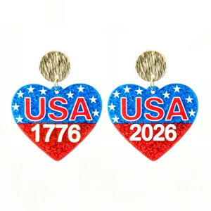 USA Independence Day 250th anniversary heart earrings detail shot, red blue glitter design.