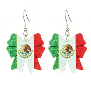Close-up detail of the sparkling glitter Mexican flag bow earrings, featuring detailed craftsmanship.
