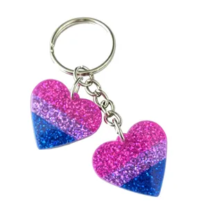 Glitter heart keychain bag charm with pink purple blue sparkling resin pendants and rings.