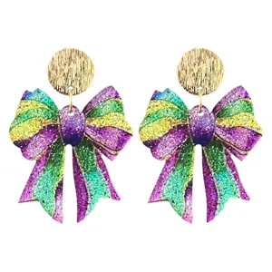 Glitterende carnaval strik oorbellen met gouden schijfstekers voor feestelijke kleding.