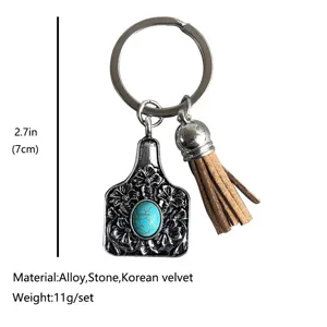 Western cowboy style vintage cow tag keychain with turquoise alloy pendant and leather tassel charm