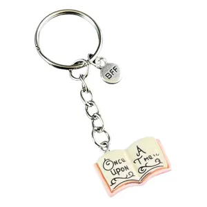 Portachiavi libro in metallo con ciondolo BFF e libro in miniatura per lettori.