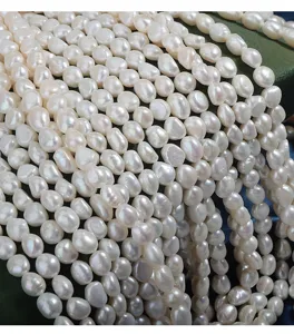Natural freshwater baroque pearl strands, 9mm white irregular pearl beads detail display.