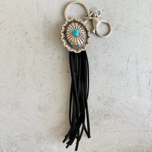 Retro Western style turquoise concho keychain with black leather fringe tassel for bags and keys.