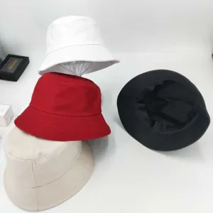 Classic cotton bucket hat for men and women, solid color casual sun protection hat.