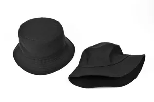 Close-up detail of plain black cotton bucket hat showing neat stitching and soft fabric.