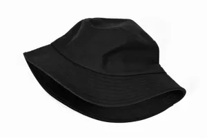 Close-up detail of the black cotton bucket hat showcasing clean stitching and texture.