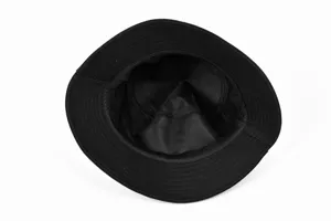 Black cotton bucket hat interior detail shot, showing precise stitching and lining design.