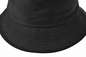 Close-up view of black bucket hat brim with neat multi-stitched lines, soft cotton texture.