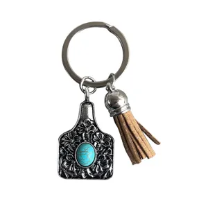 Western vintage cowboy turquoise cattle tag pendant leather tassel keychain main view