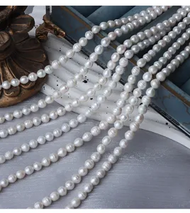 Detailed shot of 7mm ribbed baroque natural freshwater pearl strands for DIY jewelry making.