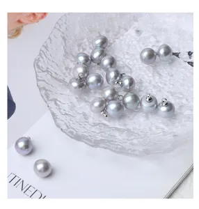 Grey freshwater pearl buttons for clothing DIY accessories, smooth luster and elegant design.