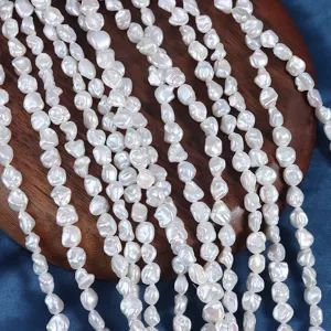 Detailed view of 7-8mm natural freshwater baroque pearl strands, irregular shape for handmade jewelry.