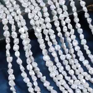 Detail shot of natural freshwater baroque pearl strands, irregular shape with high luster.
