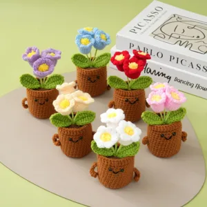 Handmade crochet potted flowers detail view, cute mini knit flower decor for desktop home room.