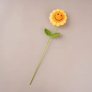 Handcrafted crochet smiley sunflower detailed shot, perfect accessory or gift choice.