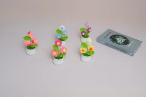Handmade crochet mini potted flowers, cute wool floral desktop ornaments for home decor.