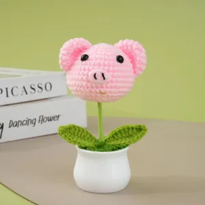 Handgemaakte gehaakte roze varkensbloem potplant, schattig wol bureau ornament voor cadeaus.
