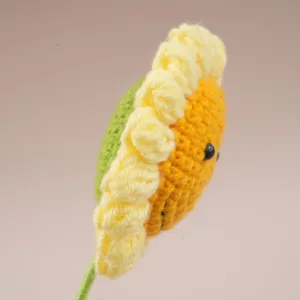 Detail view of handmade crochet sunflower yarn flower cute gift for kids and teachers.