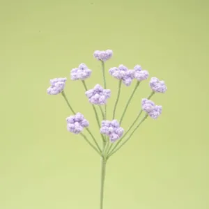 Handmade crochet baby breath flower detail, purple knitted floral branch with pearl decor.