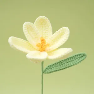 Handmade crochet yellow flower detail close up, exquisite yarn knit craft home decor ornament.