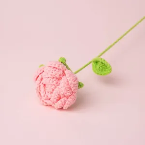 Handgehäkelte rosa Nelke Blume einzelner Stiel mit grünem Blatt für schöne Deko