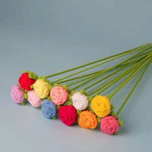 Handcrafted crochet rose flower detail, colorful knitted bouquet, long stem decor.