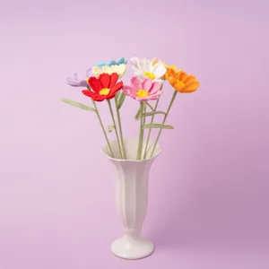 Handmade crochet cosmos flower bouquet detail view, perfect knitted home decor gift.