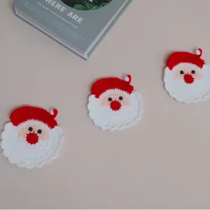 Handmade crochet Christmas Santa Claus coasters set, cute winter holiday table decor.